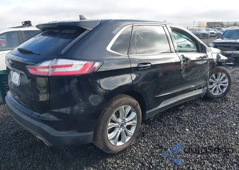 2021 Ford Edge Titanium z USA, uszkodzony, nr VIN 2FMPK4K93MBA27270